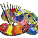 image of painter's board with paint brushes