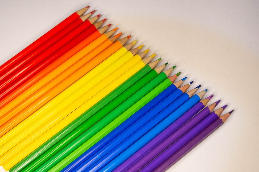 Colour pencils of red, orange, yellow, green, blue and purple like a rainbow