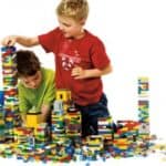 image of two boys playing with LEGO blocks