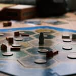 photo of the board game Catan showing playing pieces on the game board.