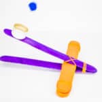 purple and gold popsicle stick catapult