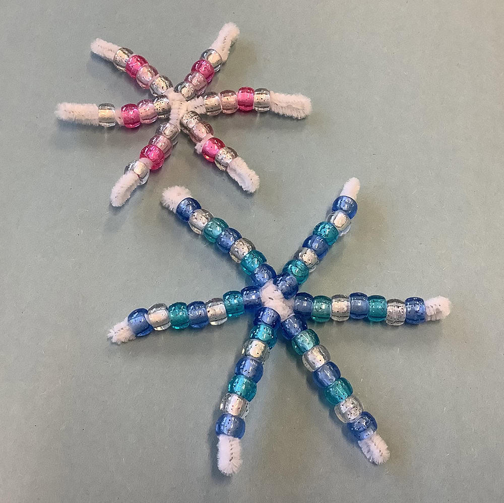 red and blue beaded snowflakes