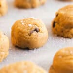 cookie dough shaped into cookies on a pan