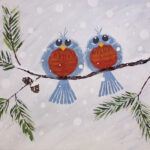 image of a painting of two blue birds on a branch in winter