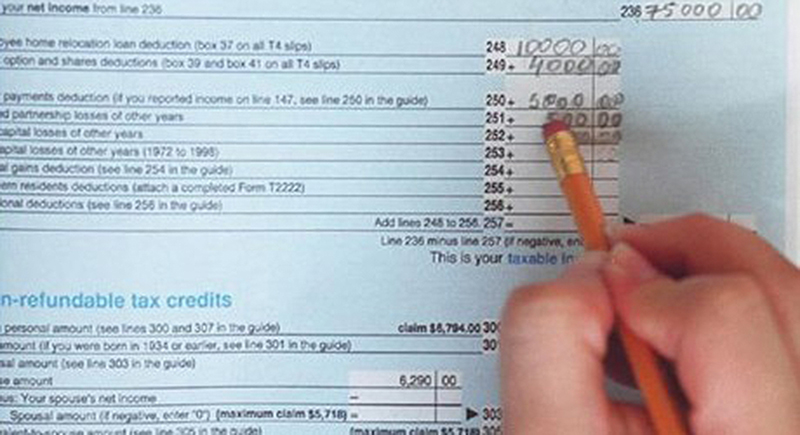 image of a tax form being filled out in pencil