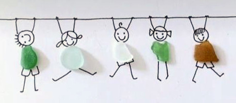 five pieces of sea glass on a paper with drawings of five stick figures holding a line