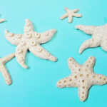 image of starfish made of salt dough on a blue background