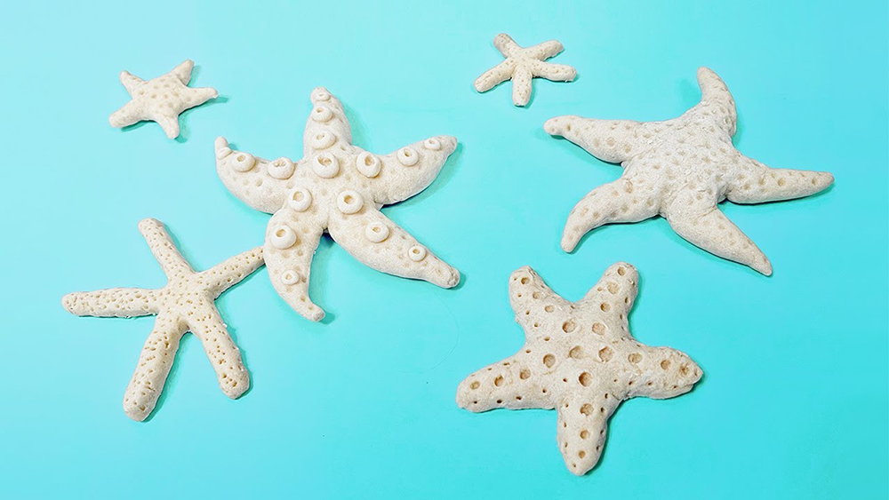 image of starfish made of salt dough on a blue background