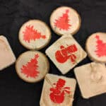 image of wooden coasters with red Christmas stamps on them