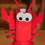 image of a red lobster craft made from a paper roll
