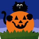 image of a paper craft of a black cat and an orange jack-o-lantern.