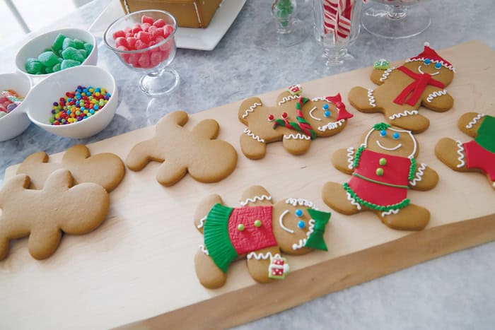 image of gingerbread cookies on a wooden cutting board.