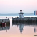 image of a lighthouse on the end of a wharf