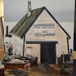 A painting of an old fishing shack with construction scraps laying around it. Above the door it says "Tidal Boatworks".