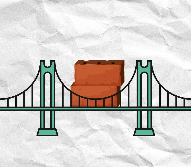 An illustration of a green bridge. It has two bricks on top of it and the background is crumpled paper.